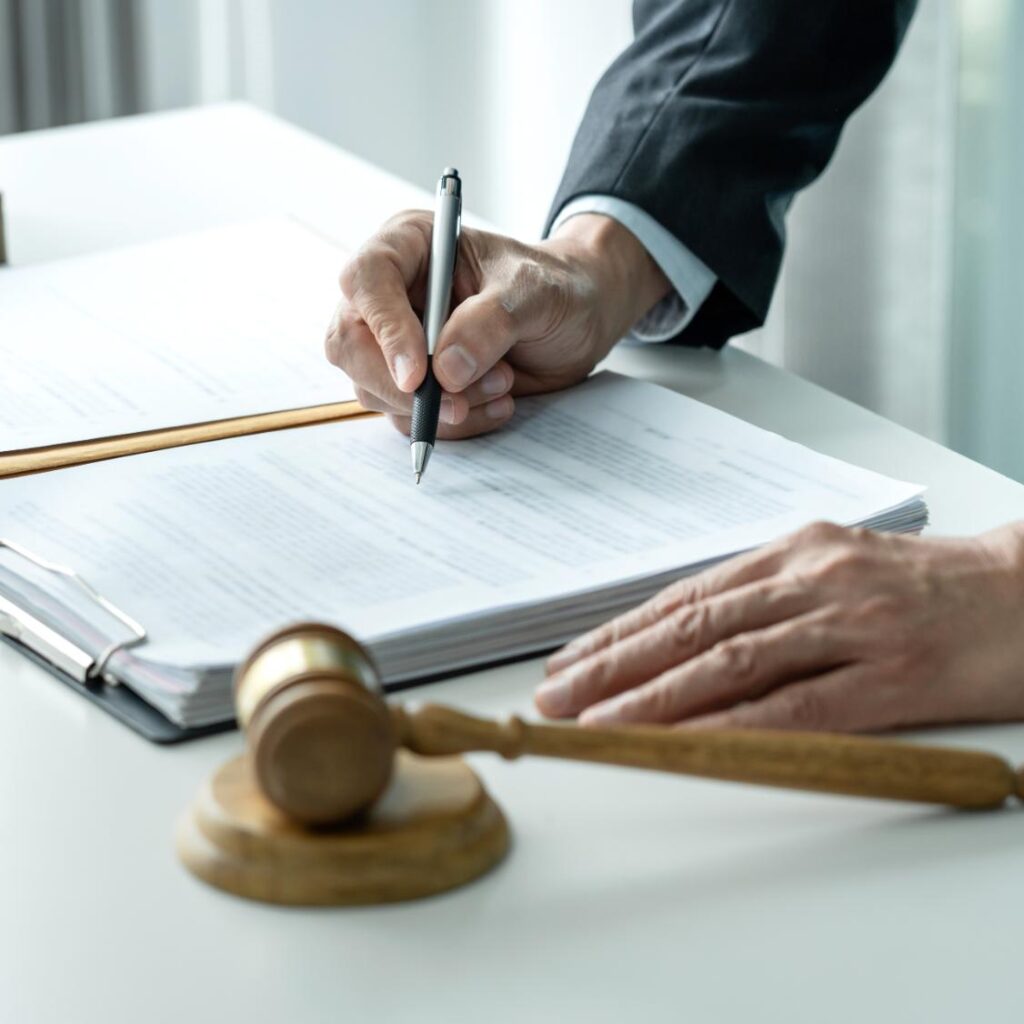 A Male Lawyer Or Notary Working With Contract Pape MUEAZU4 1 1 1024x1024